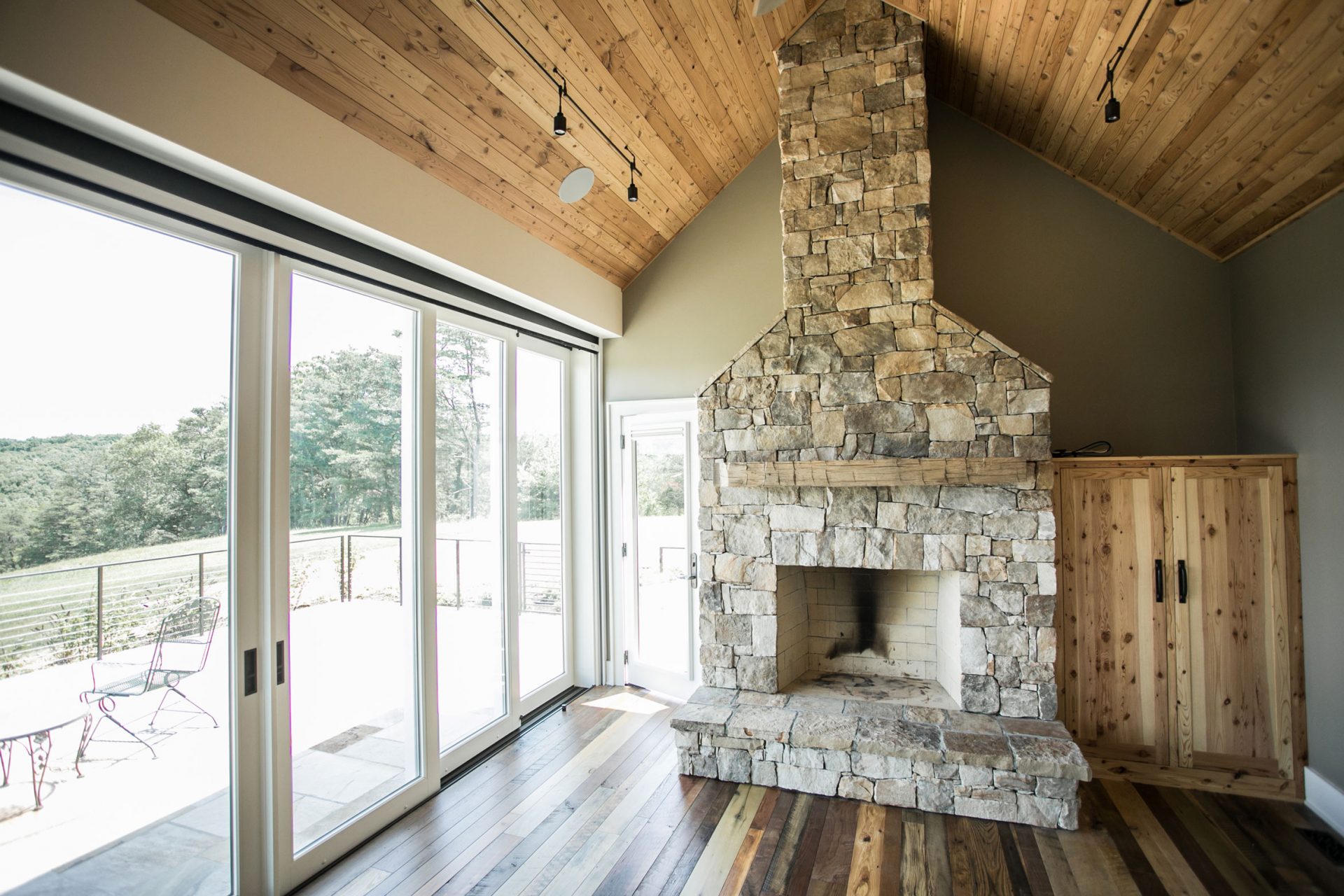 Image of Shenandoah Blend wood flooring with stone fireplace