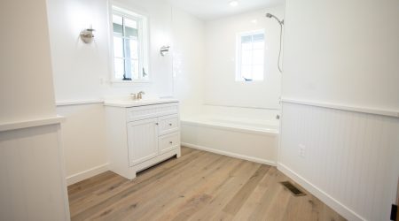 Image of bathroom with gray ghost floor