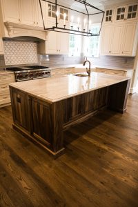 Image of Chestnut Color Flooring in Kitchen with Island by Cochran's Lumber