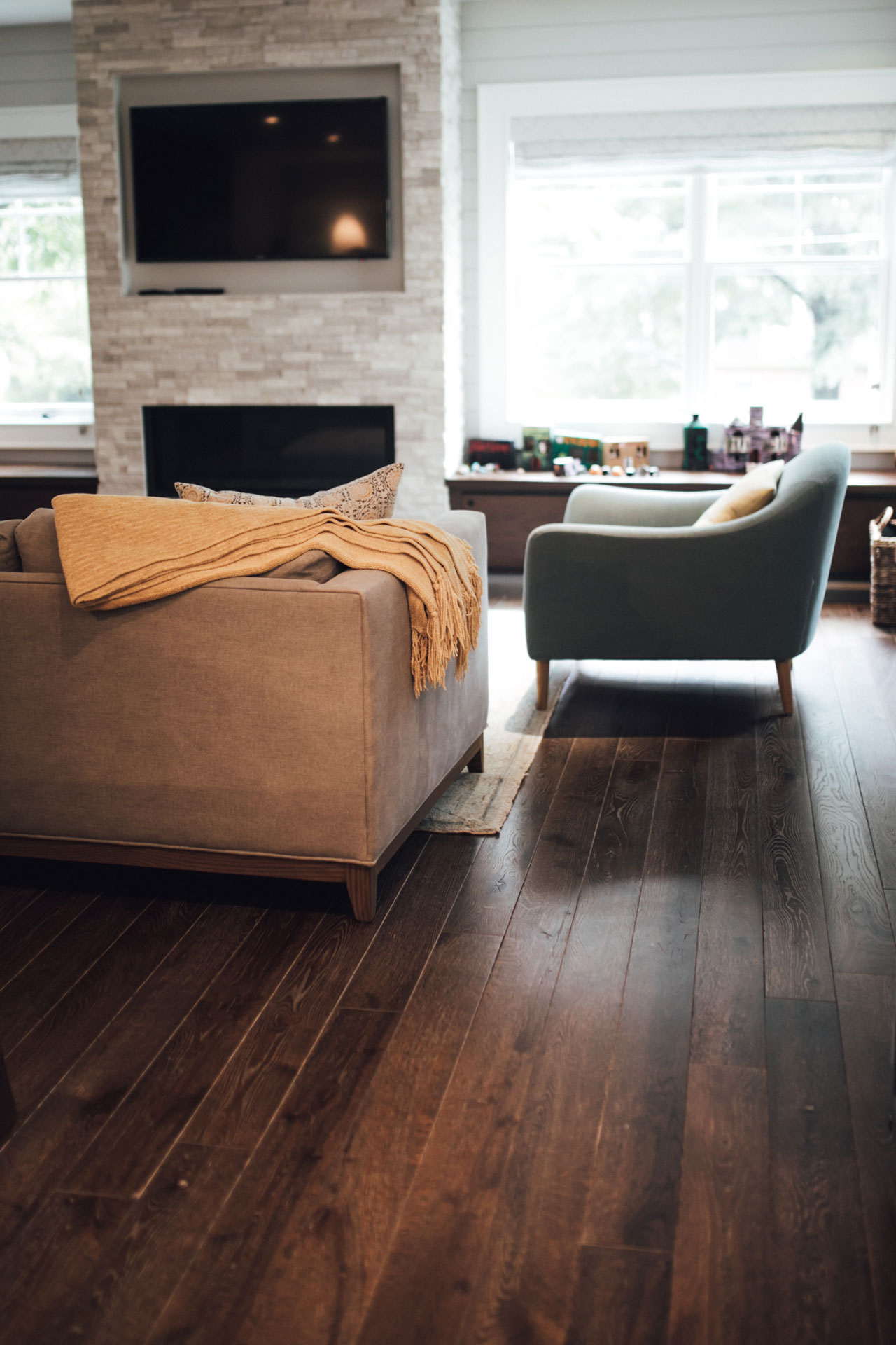 Fort McHenry living room - American Heritage flooring by Cochran's Lumber