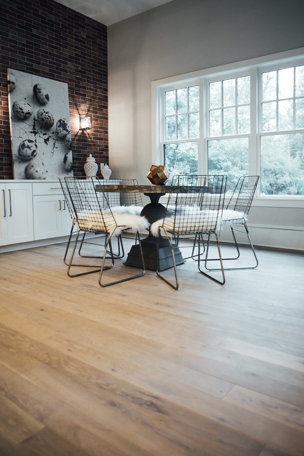 Grey Ghost - Dining space design with American Heritage Flooring by Cochran's Lumber