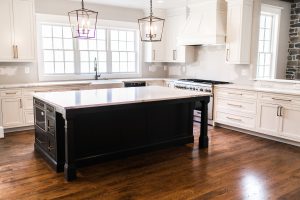 Clean Modern Farmhouse Kitchen with Cochrans Lumber Flooring